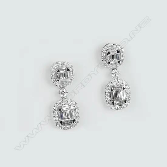 A pair of lady's modern 18ct. white gold and multi-diamond set drop earrings