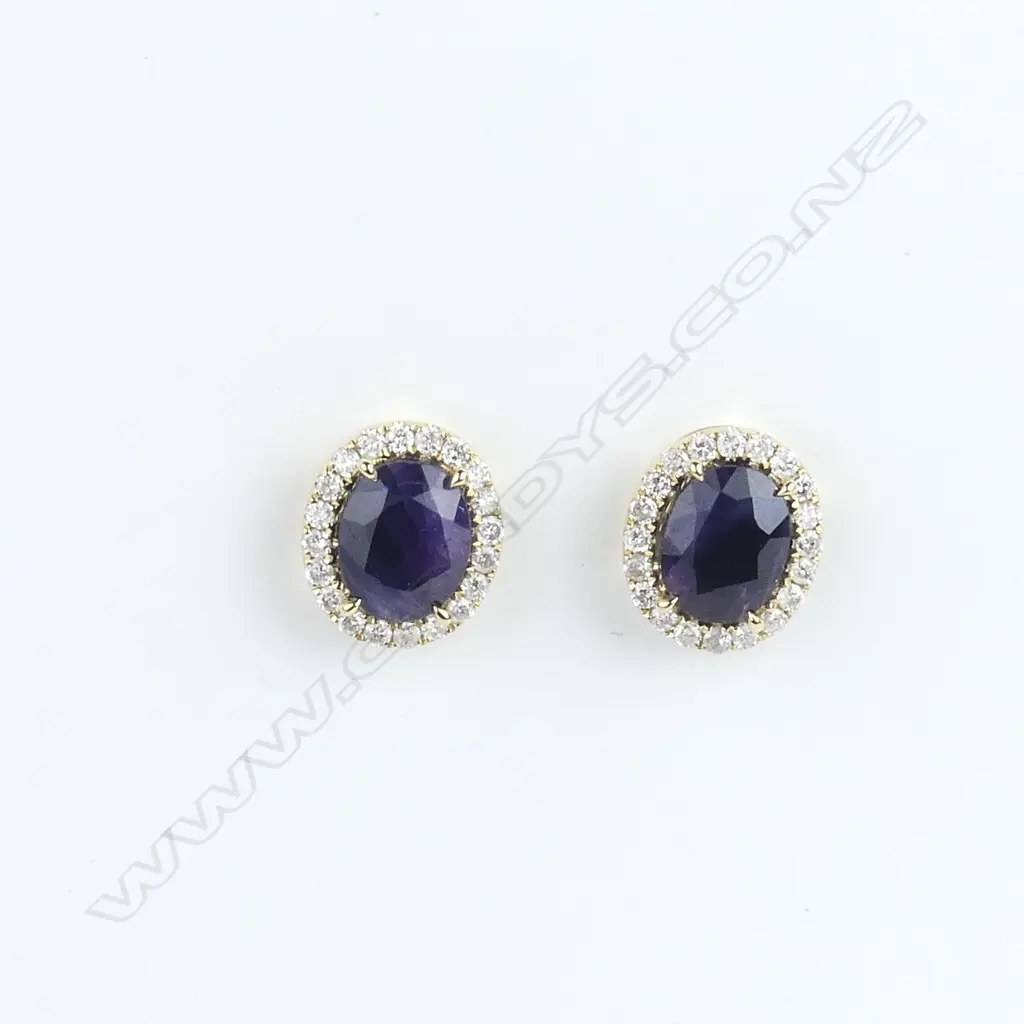 A pair of 18ct gold sapphire and diamond earrings Image 1++