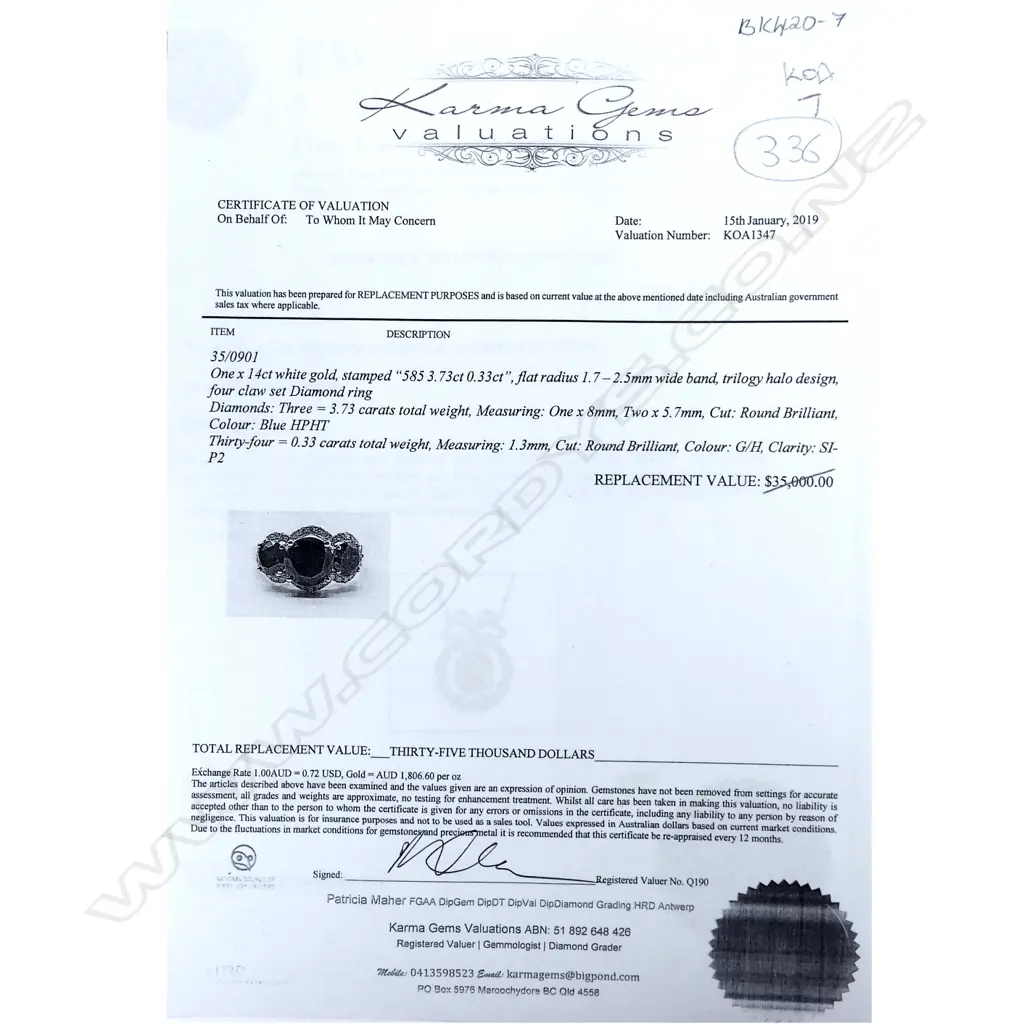 A 14ct gold and diamond trilogy halo ring featuring Image 1++