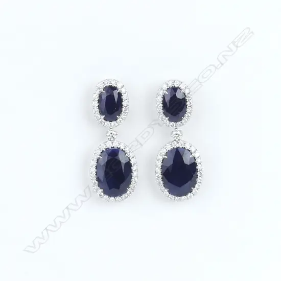 A pair of 18ct white gold sapphire and diamond earrings