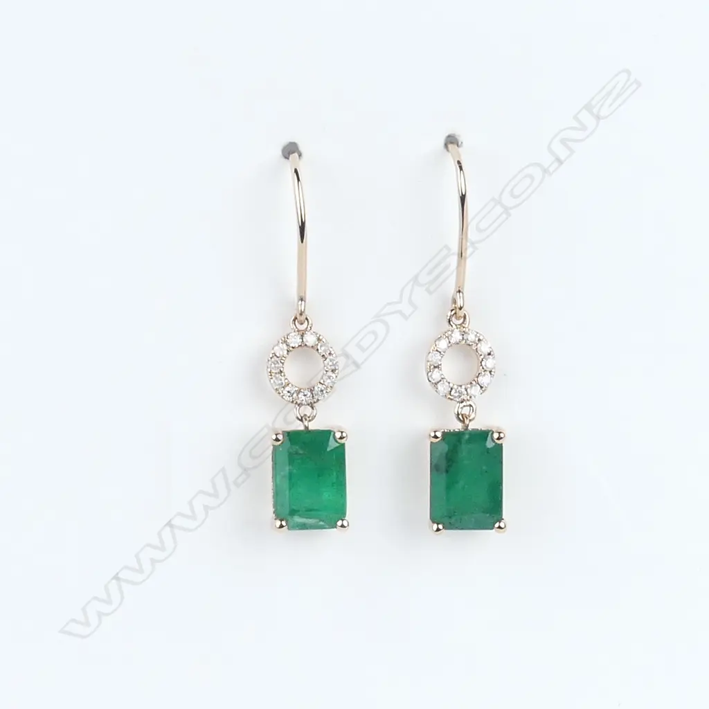A pair of 14ct rose gold emerald and diamond earrings Image 1++
