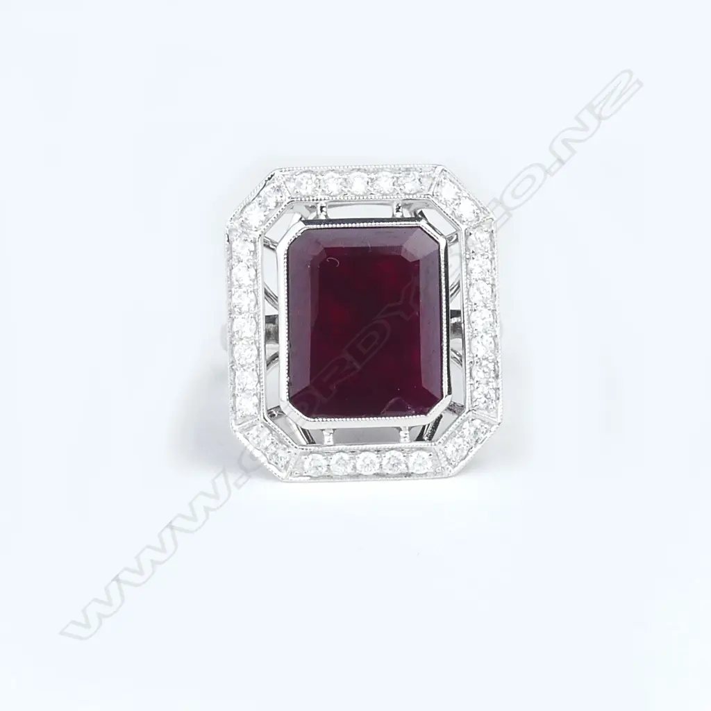 An 18ct white gold ruby and diamond dress ring Image 1++
