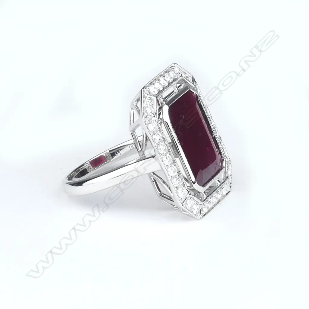 An 18ct white gold ruby and diamond dress ring Image 1++