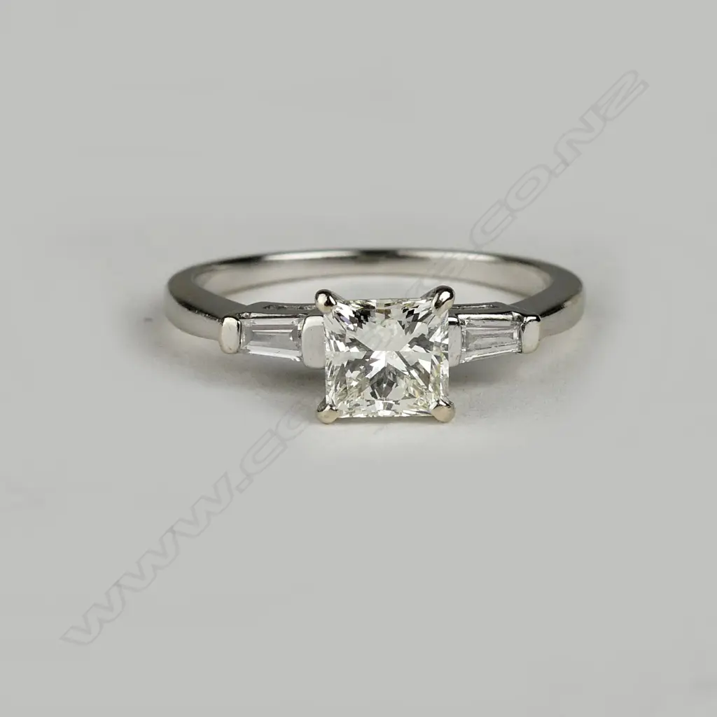 An 18ct white gold and diamond solitaire ring Image 1++