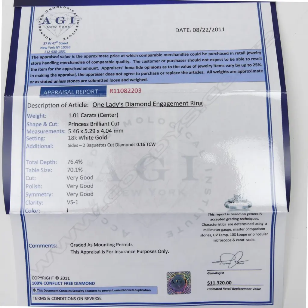 An 18ct white gold and diamond solitaire ring Image 1++