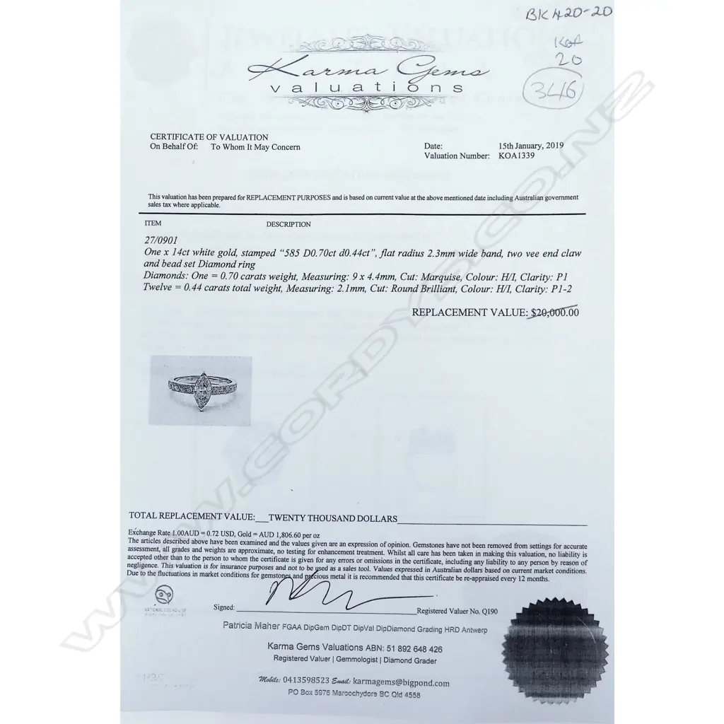 A 14ct white gold and diamond ring Image 1++