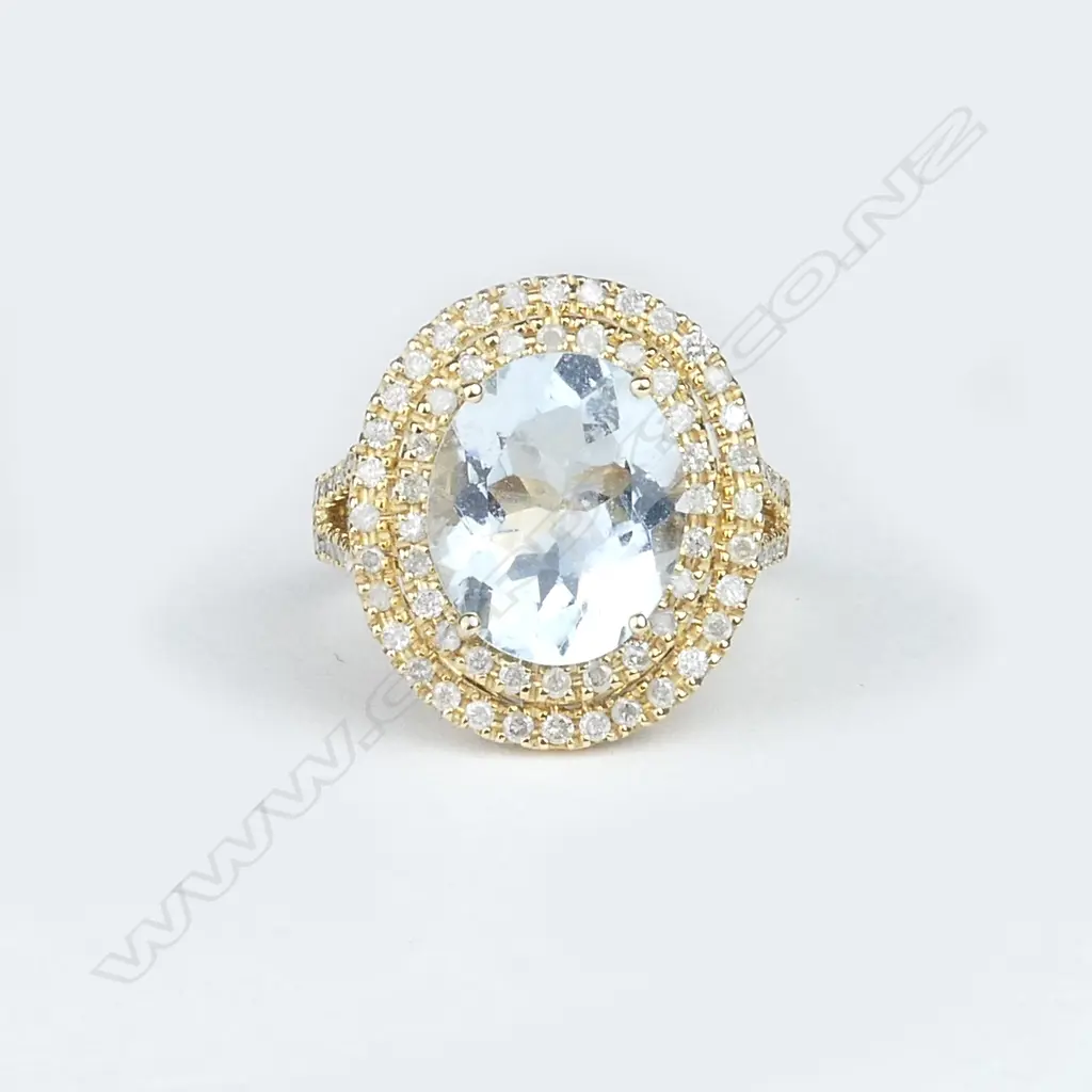 14ct yellow gold aquamarine and diamond halo ring Image 1++