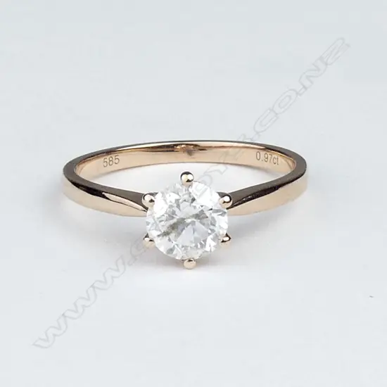 A 14ct rose gold diamond solitaire ring