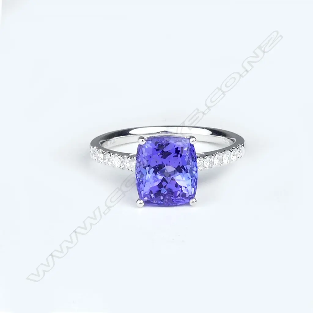 An 18ct white gold tanzanite and diamond ring Image 1++