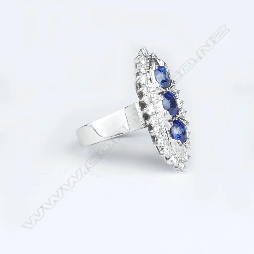 An 18ct white gold sapphire and diamond Art Deco style ring Image 1++