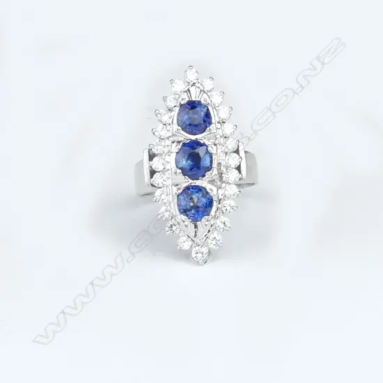 An 18ct white gold sapphire and diamond Art Deco style ring