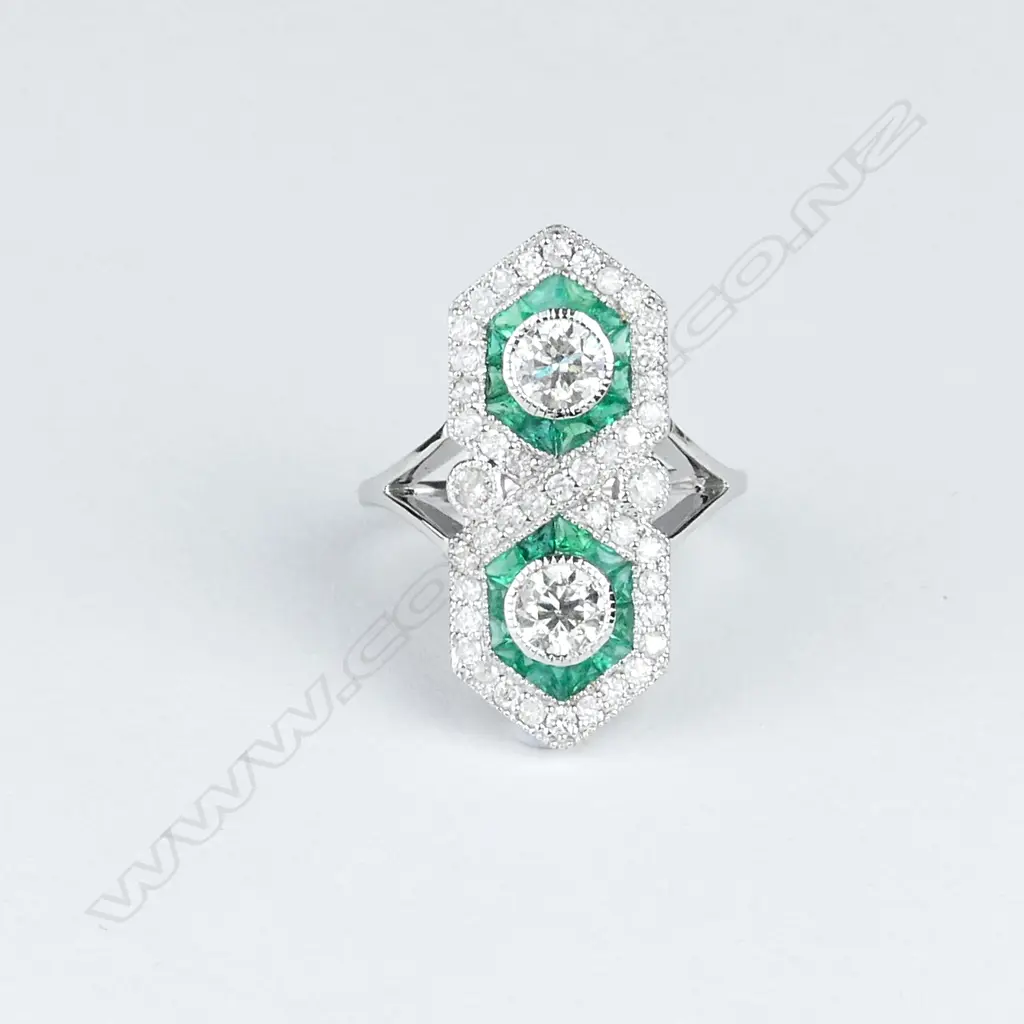 An 18ct. white gold emerald and diamond Art Deco style ring Image 1++