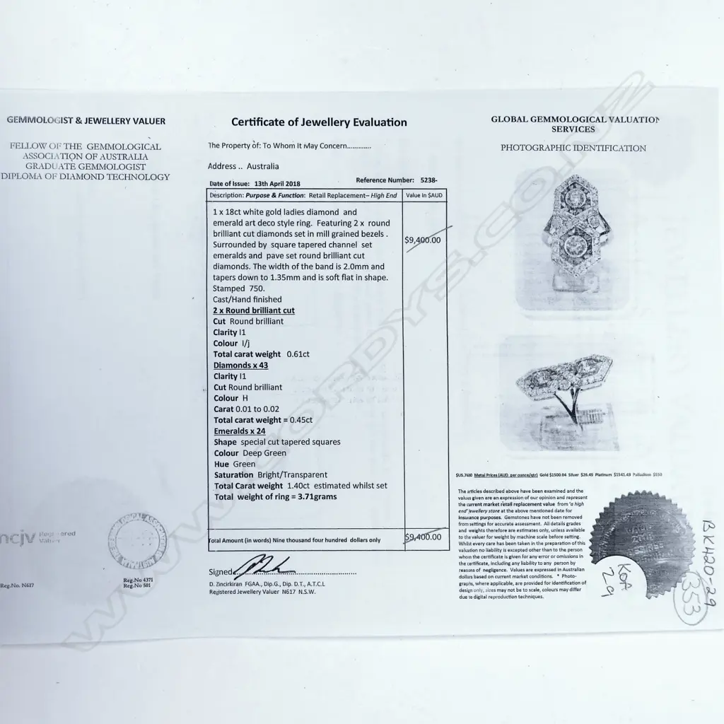 An 18ct. white gold emerald and diamond Art Deco style ring Image 1++