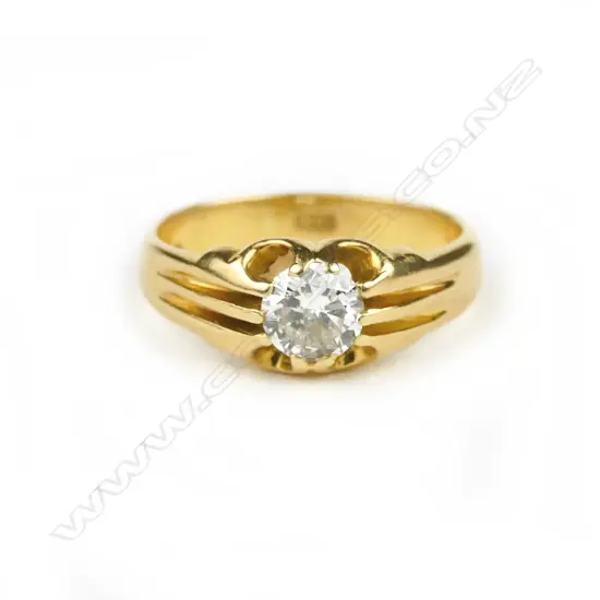 A gent's 18ct. gold and diamond ring