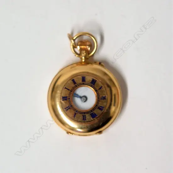 An 18ct. yellow gold lady's half hunter fob watch
