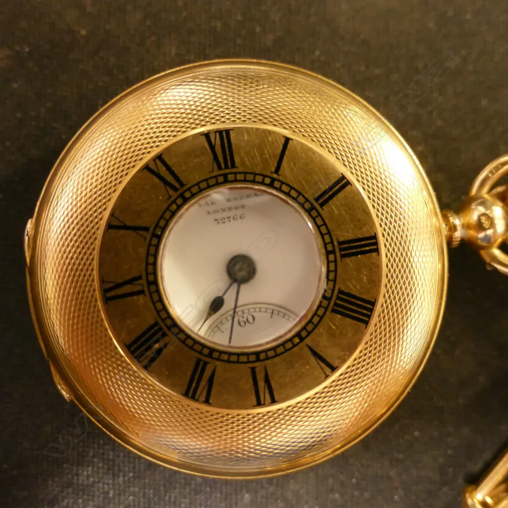 An early 20thC E. Dent & Co. 18ct. yellow gold half-hunter pocket watch Image 1++