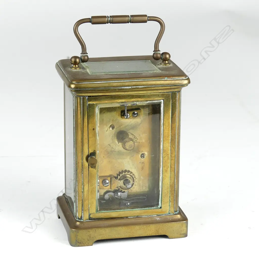 A brass cased carriage clock Image 1++