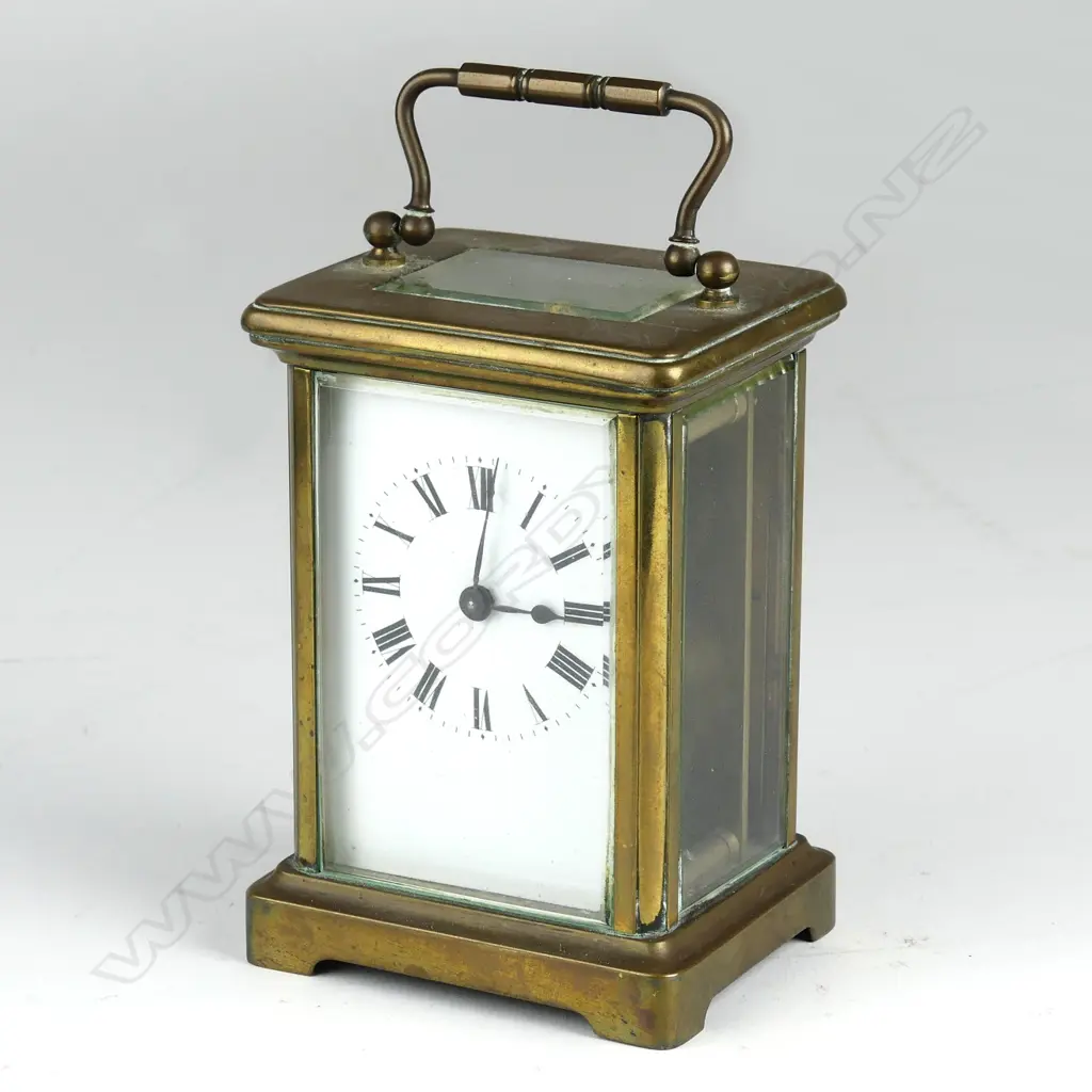A brass cased carriage clock Image 1++