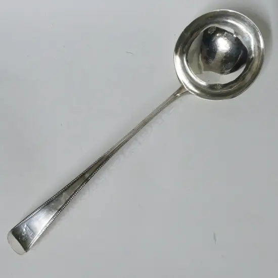 A George III silver soup ladle