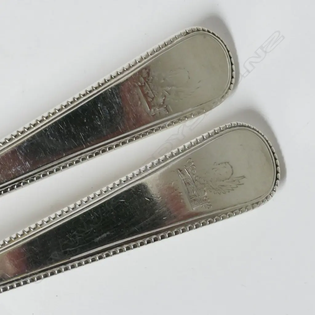 A pair of George III silver pie spoons Image 1++