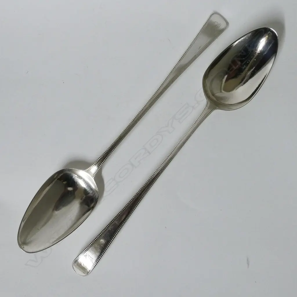 A pair of George III silver pie spoons Image 1++