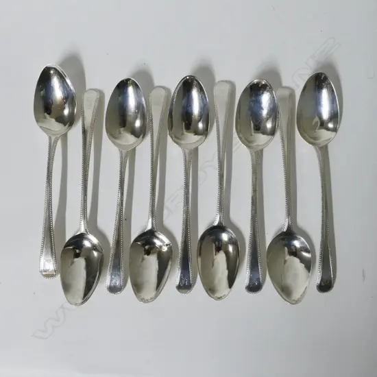 9 George III silver dessert spoons