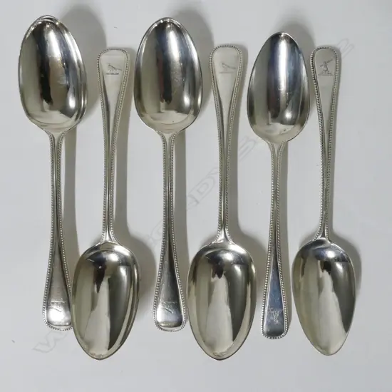 Six silver dessert spoons