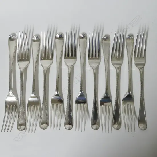12 Georgian silver table forks