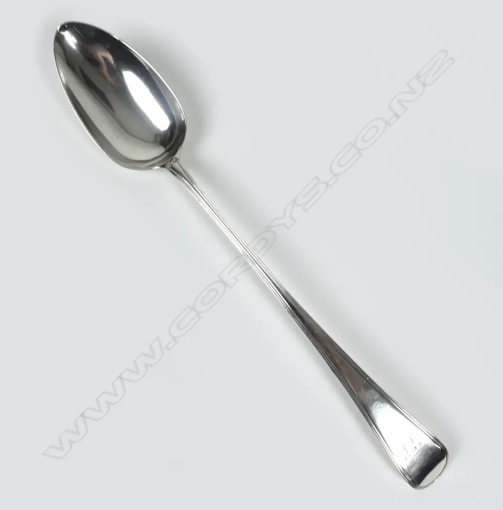 A George III silver pie spoon Image 1++