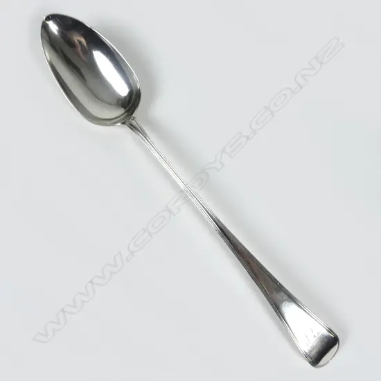 A George III silver pie spoon