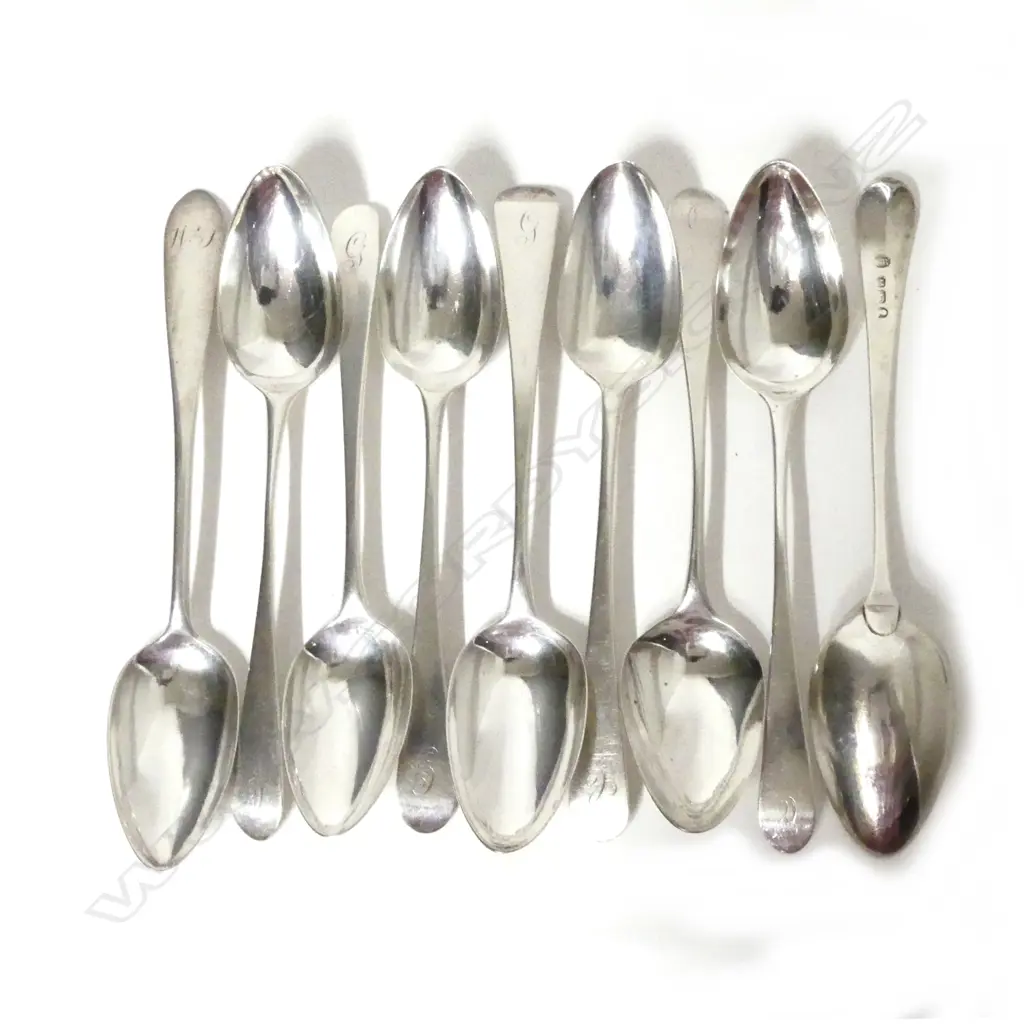 Nine Georgian silver dessert spoons Image 1++
