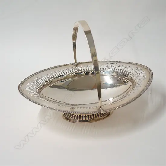 A 1920s silver oval swing handle basket