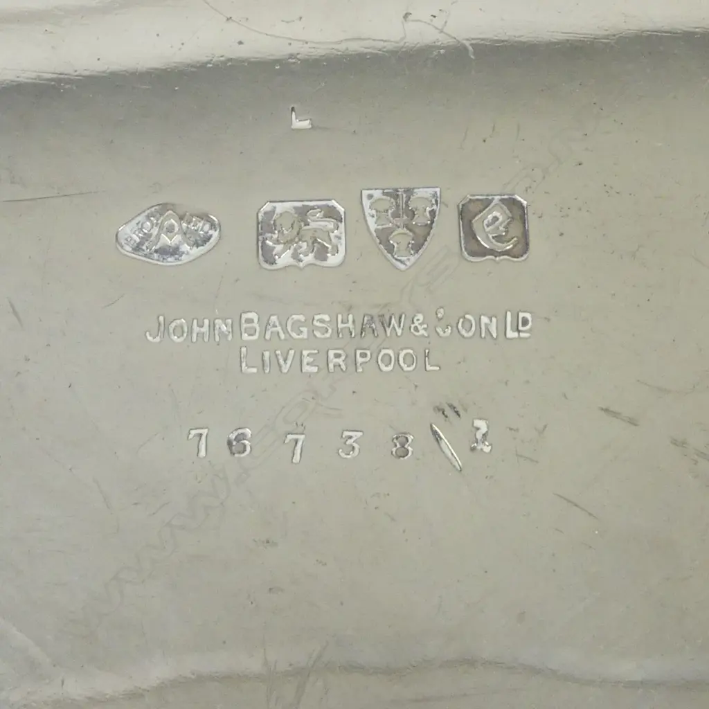 A silver two handled fruit bowl Image 1++