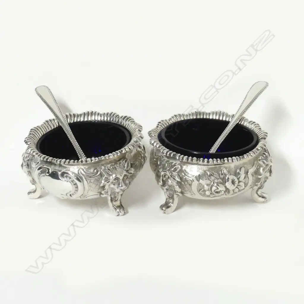 A pair of Victorian silver squat circular salts Image 1++