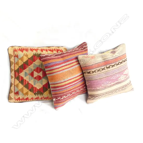 Three kilim faced cushions