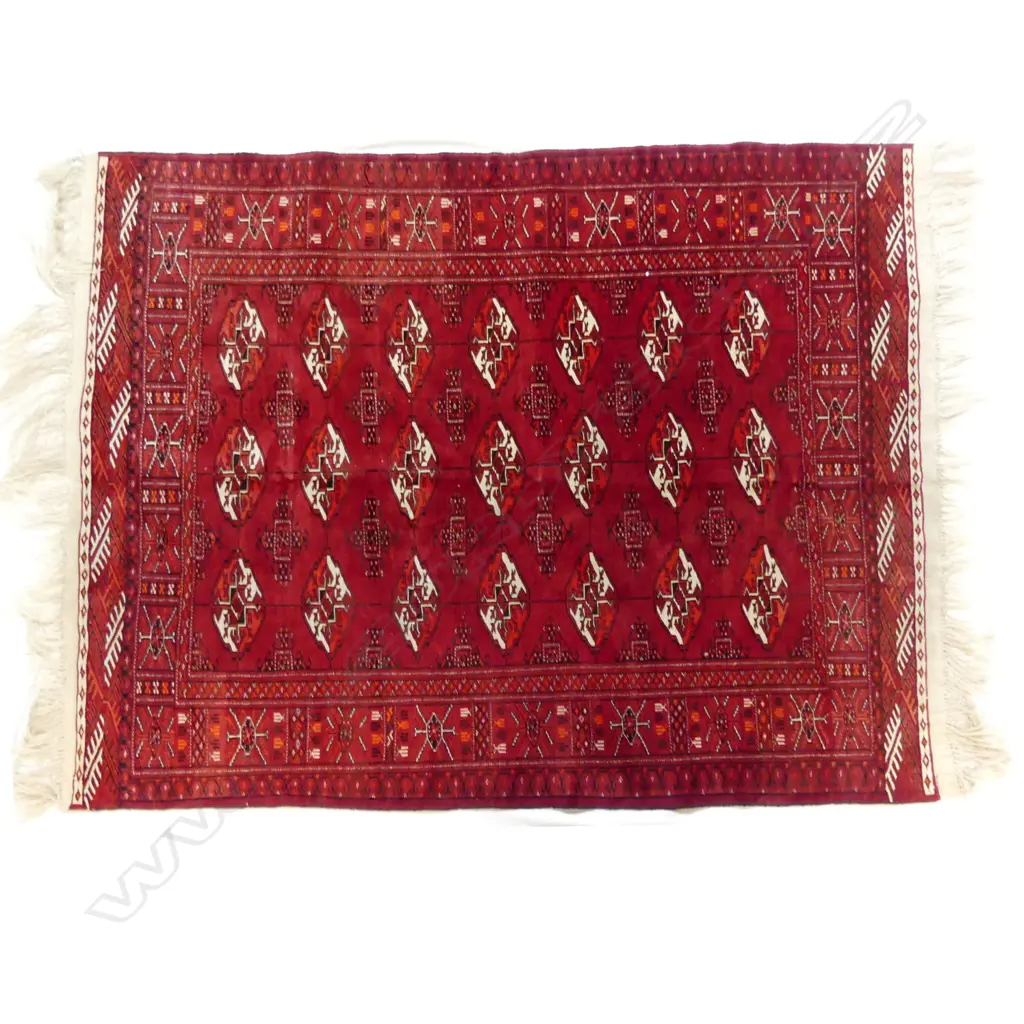 A fine quality hand knotted Tekke Turkoman rug of traditional design Image 1++