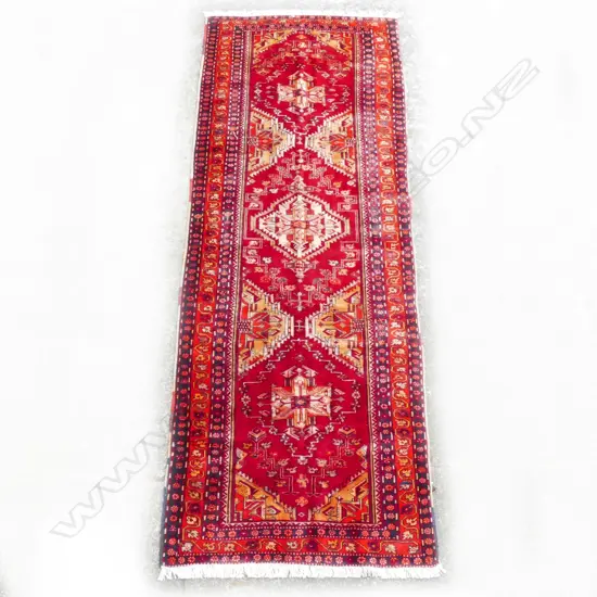 A Persian hand knotted runner