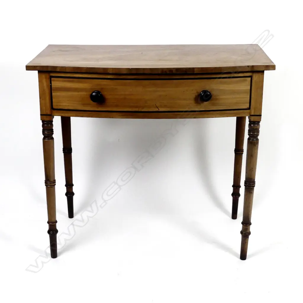 A small Georgian light mahogany bowfront side table Image 1++