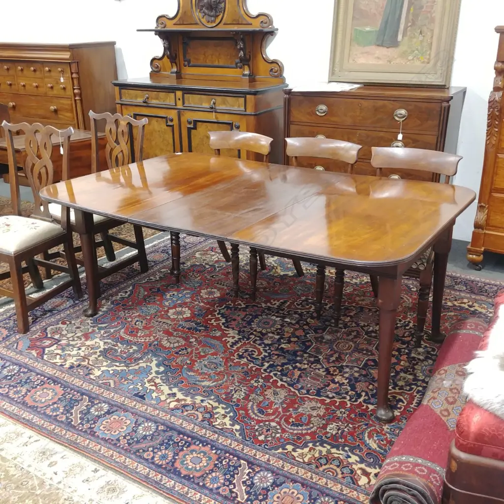 A late Georgian mahogany dining table Image 1++