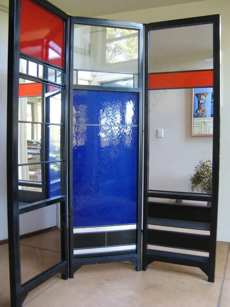 A glass three panel screen by Holly Sanford (b.1947) N.Z.S.A.G. Image 1++