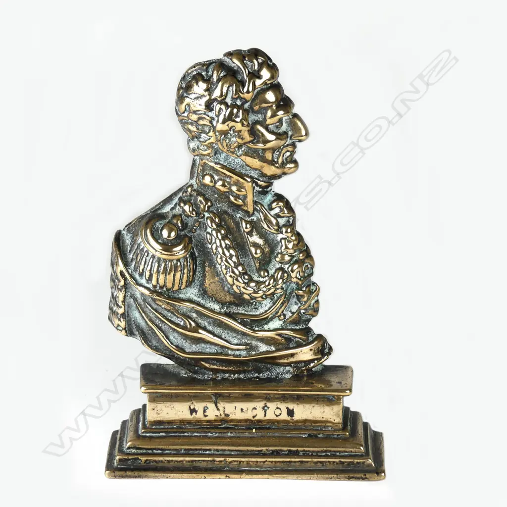 A Victorian brass doorstop Image 1++