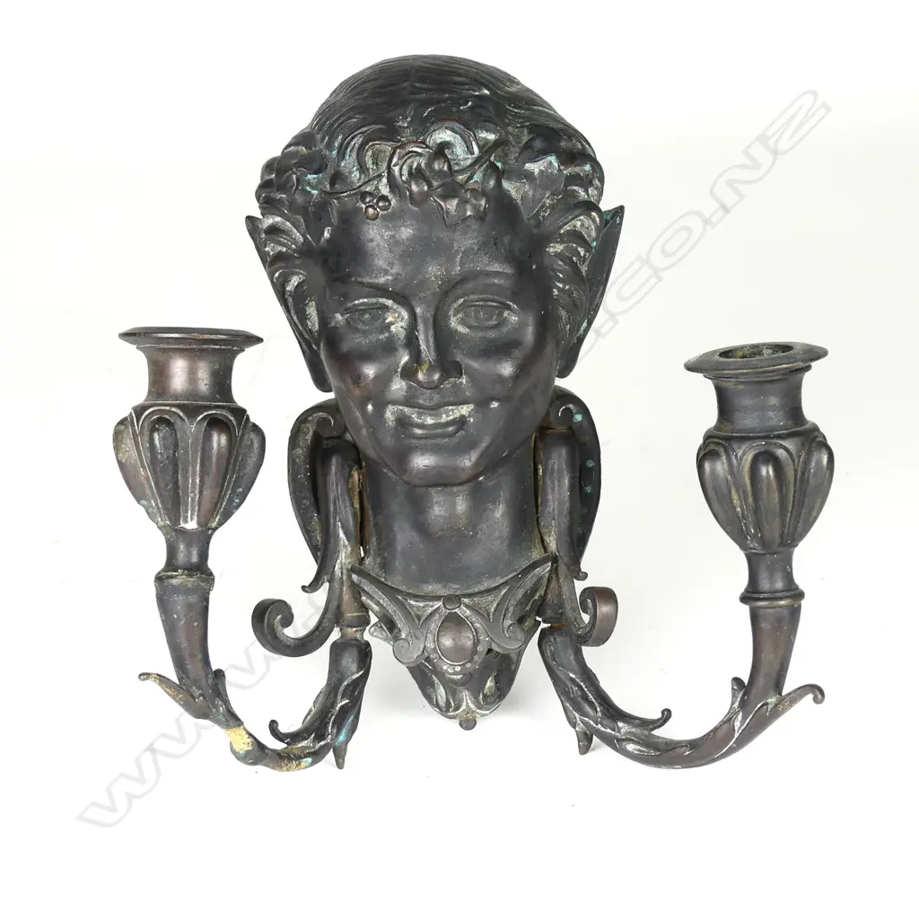 A Victorian bronze wall candle sconce Image 1++