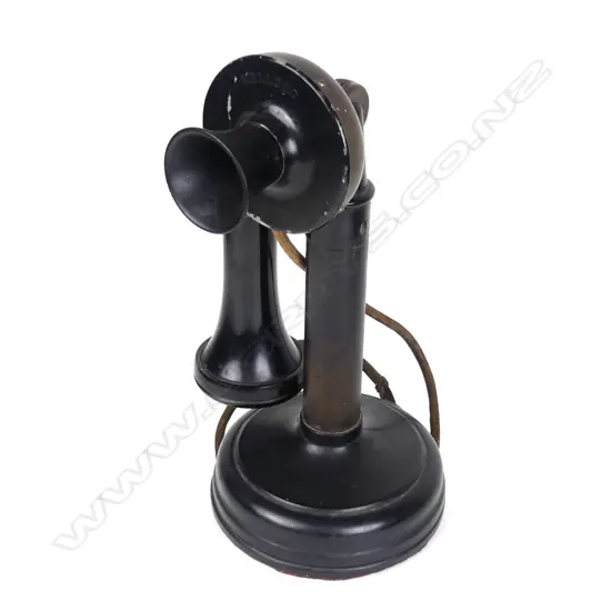 A Kellogg's Edwardian period black enamelled metal candlestick telephone