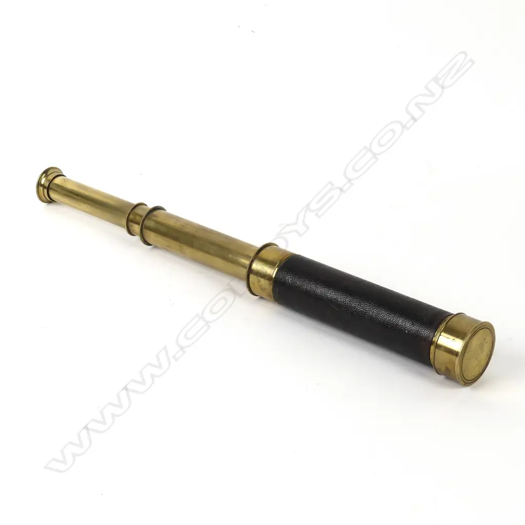 A brass three draw pocket telescope Image 1++