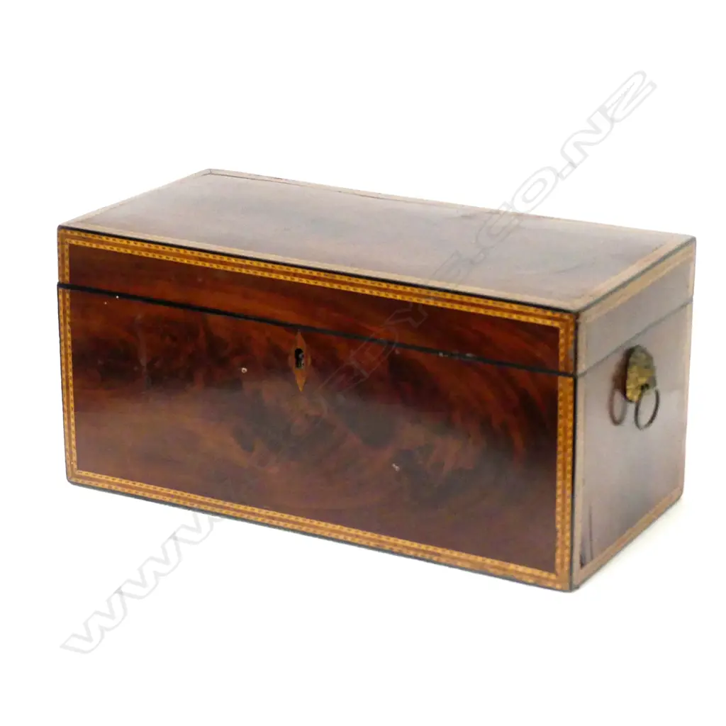 A Regency mahogany tea caddy with satinwood stringing Image 1++