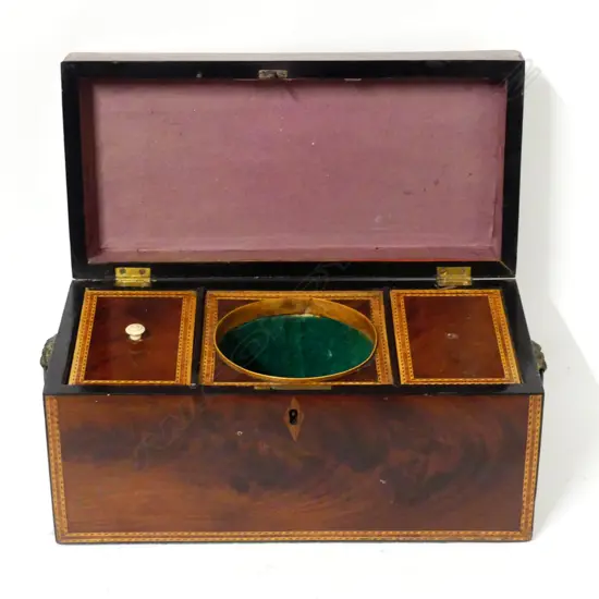 A Regency mahogany tea caddy with satinwood stringing