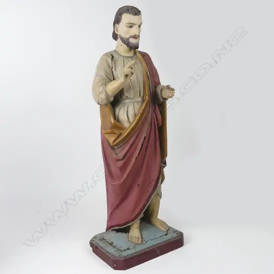 A large antique wooden statue of St. James The Greater
