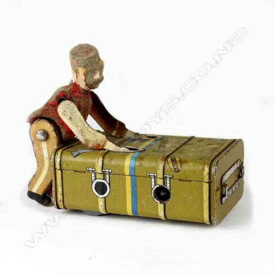 A vintage German clockwork tin toy