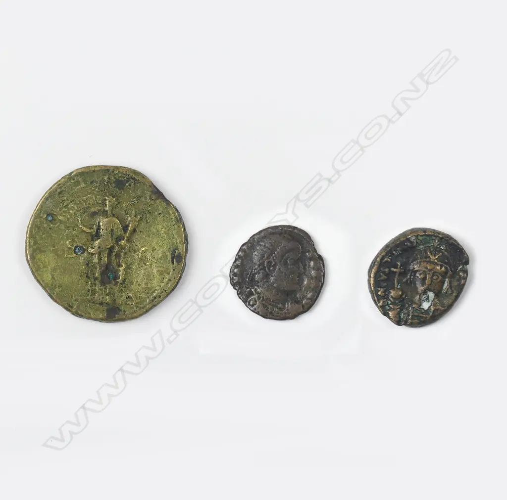 Three Roman coins Image 1++