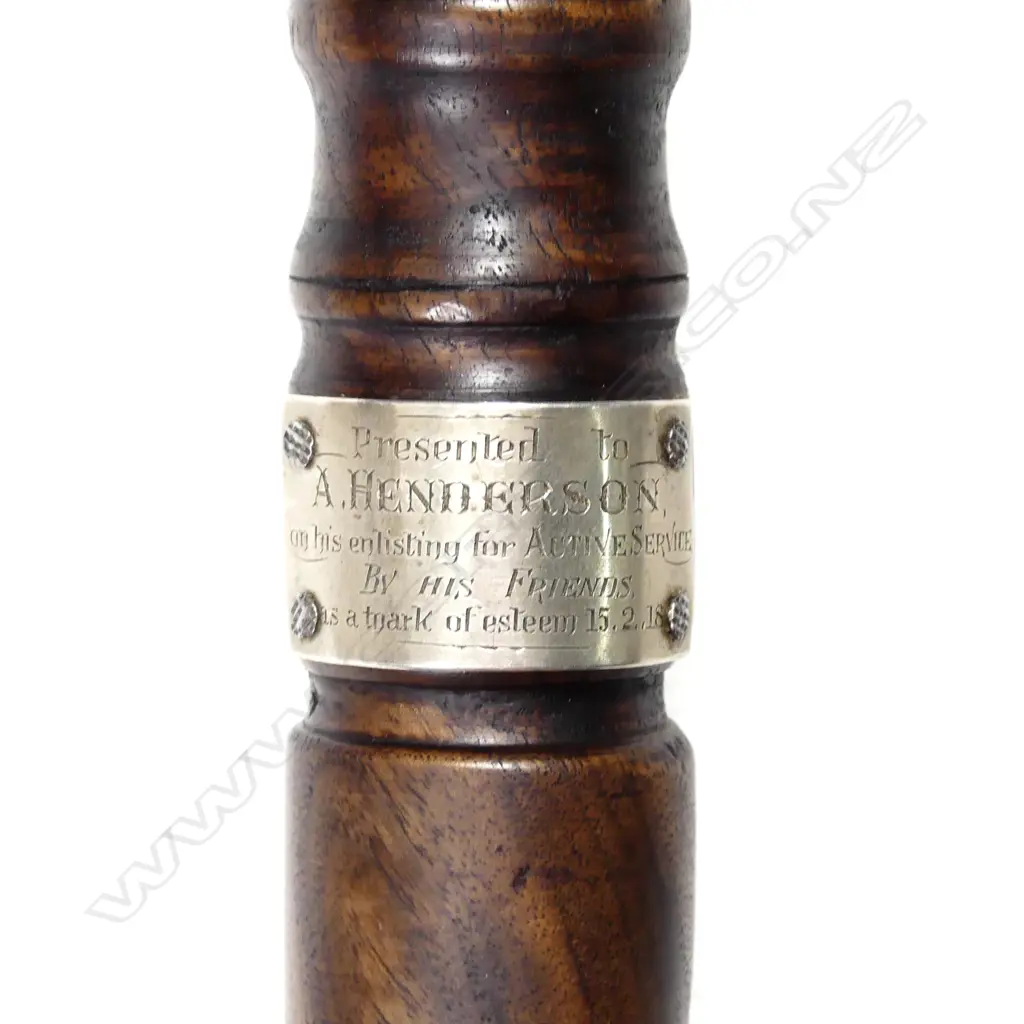 A sturdy turned mahogany walking stick Image 1++